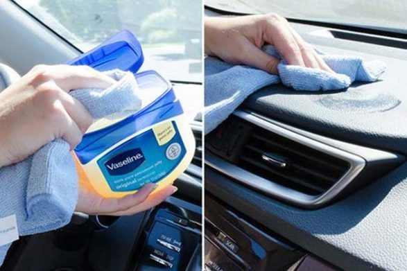 frotter de la vaseline dans le tableau de bord d'une voiture pour la nettoyer