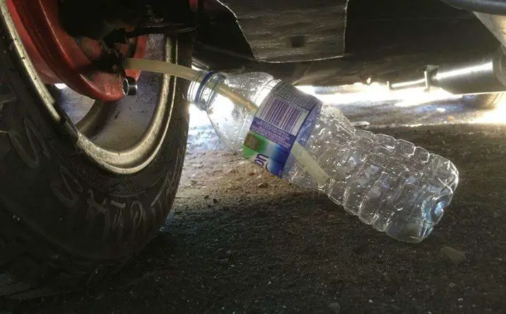 Conectar el tubo al frasco de purgado