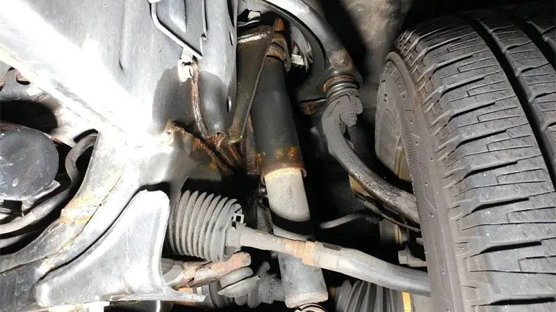 suspension fluid leak