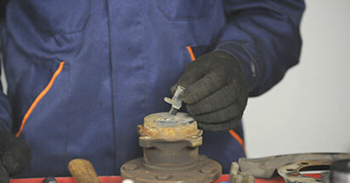 Eliminar rodamiento de rueda MAZDA 3 1.4 2007 - Instrucciones online fáciles