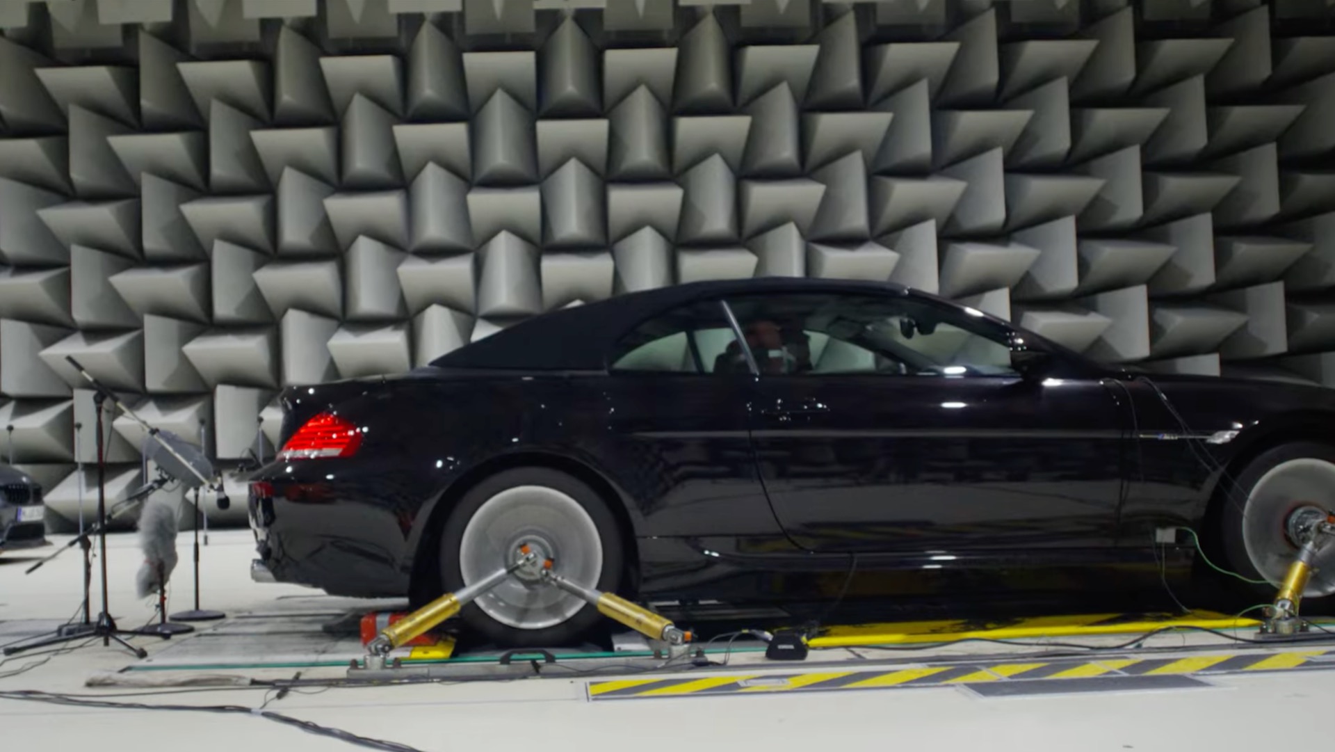 E63 BMW M6 strapped to a dyno with microphones recording its exhaust note.