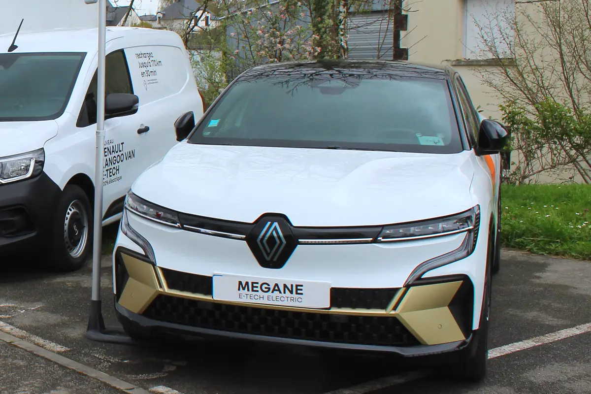 A modern electric car parked in a residential area